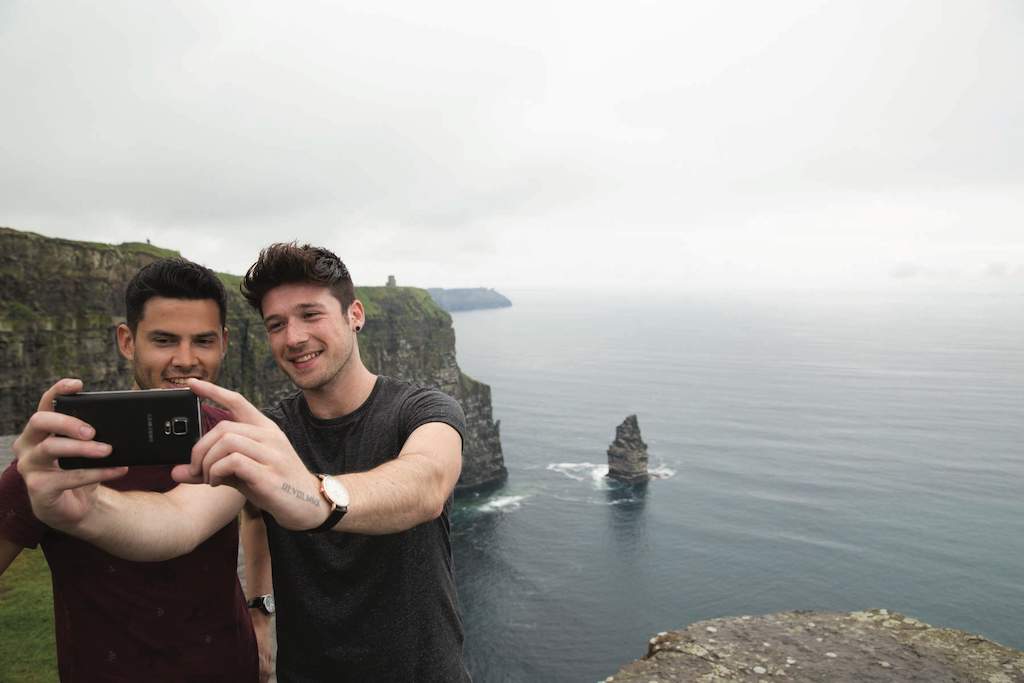 Guys taking selfie at Cliffs of Moher Co ClareWeb Size
