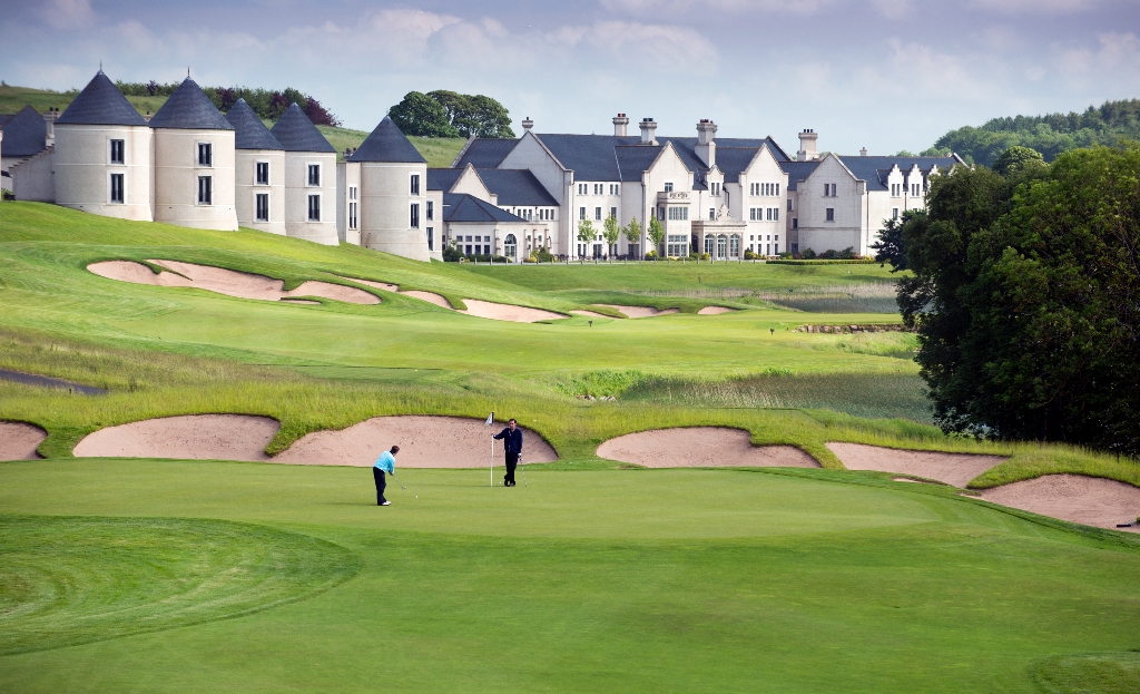 Lough Erne Resort in Fermanagh, luxury golf hotel with fairways winding along lush lakeside countryside.