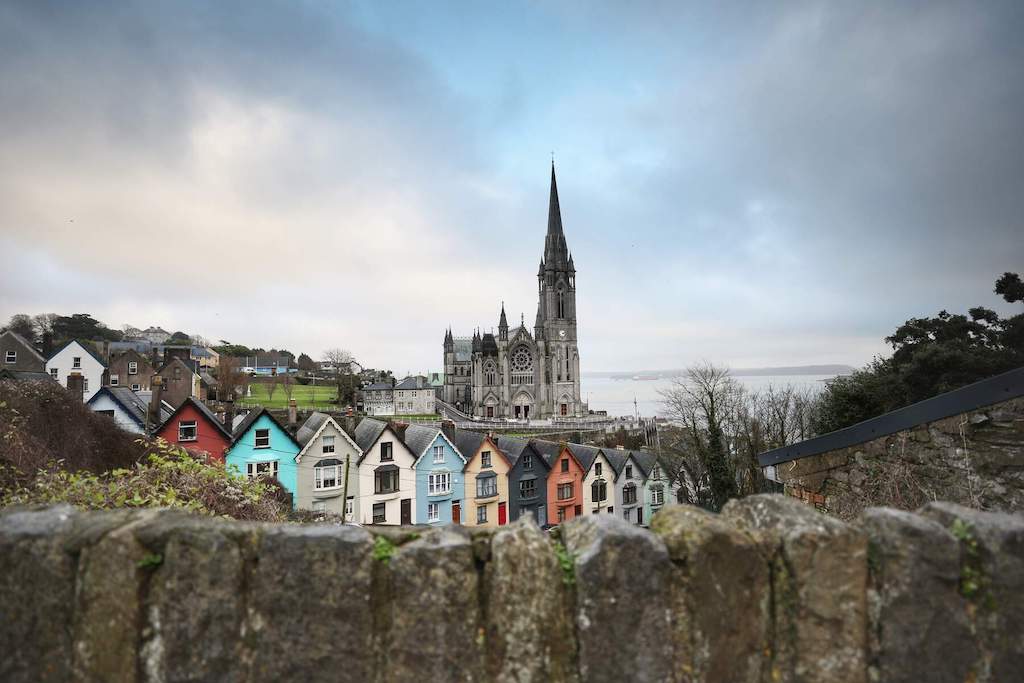 St Colman’s Cathedral rising above the painted houses of Cobh, County Cork.