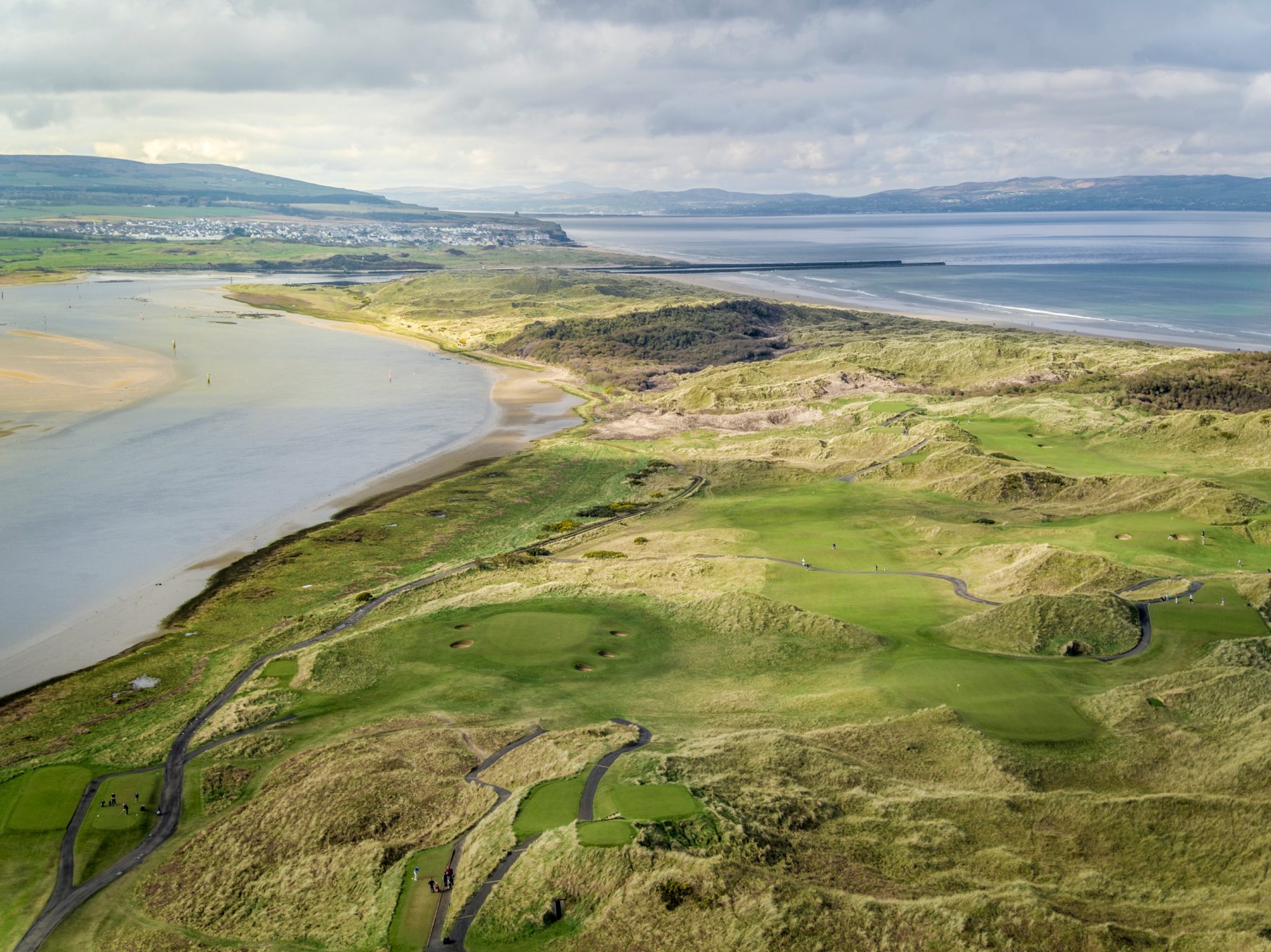 Rolling dunes and coastal fairways highlight Northern Ireland golf, stretching from County Down to Fermanagh.