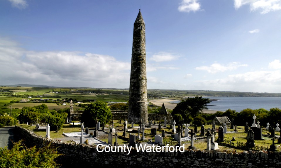 Ardmore Round Tower in County Waterford with a historic graveyard and Atlantic Ocean views.