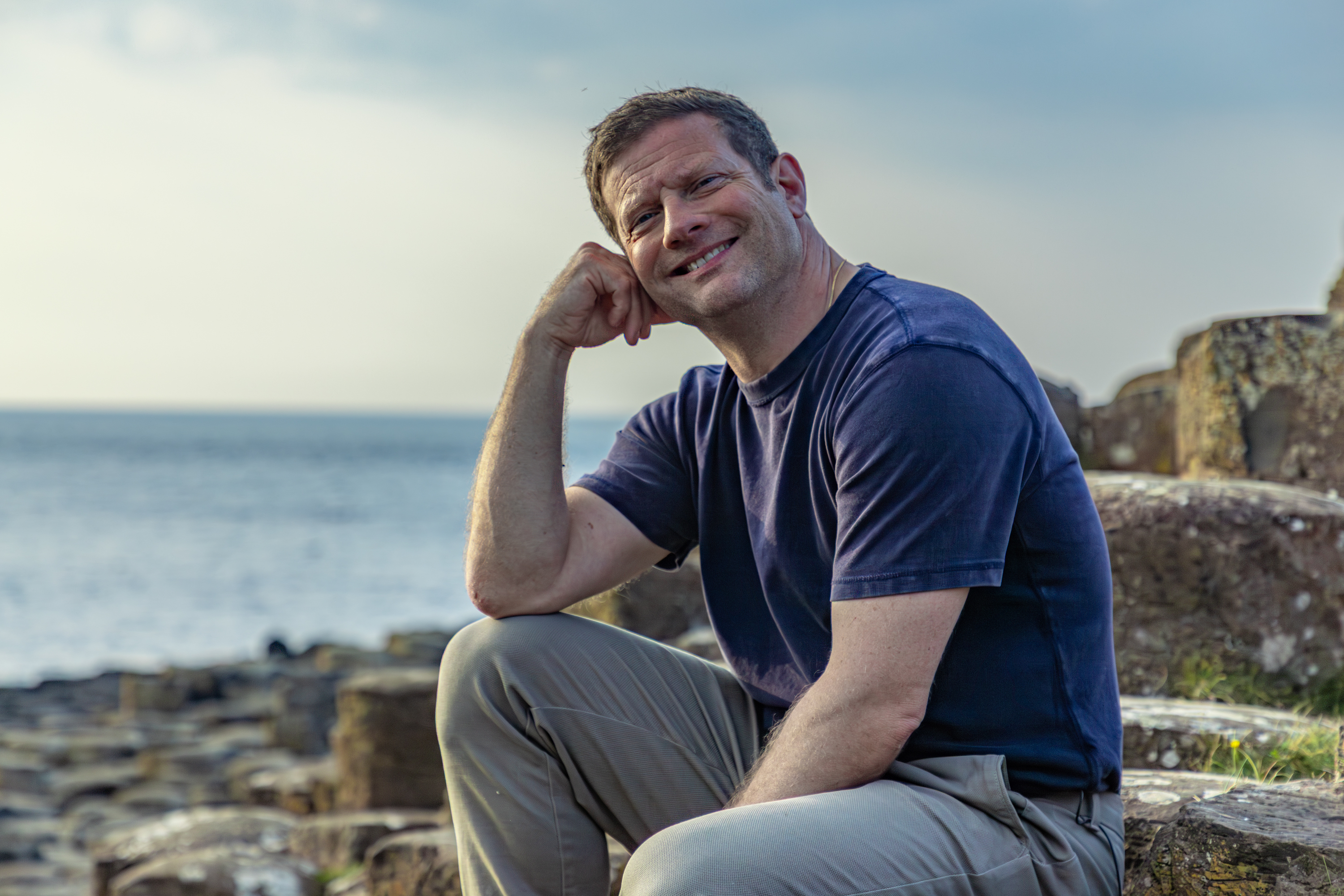IMG7130DTOI2TX3 Dermot sat on rocks at Giants Causeway