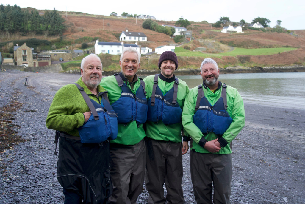 Martin and Roman Kemp with local guides on Glandore Bay beach in County Cork.