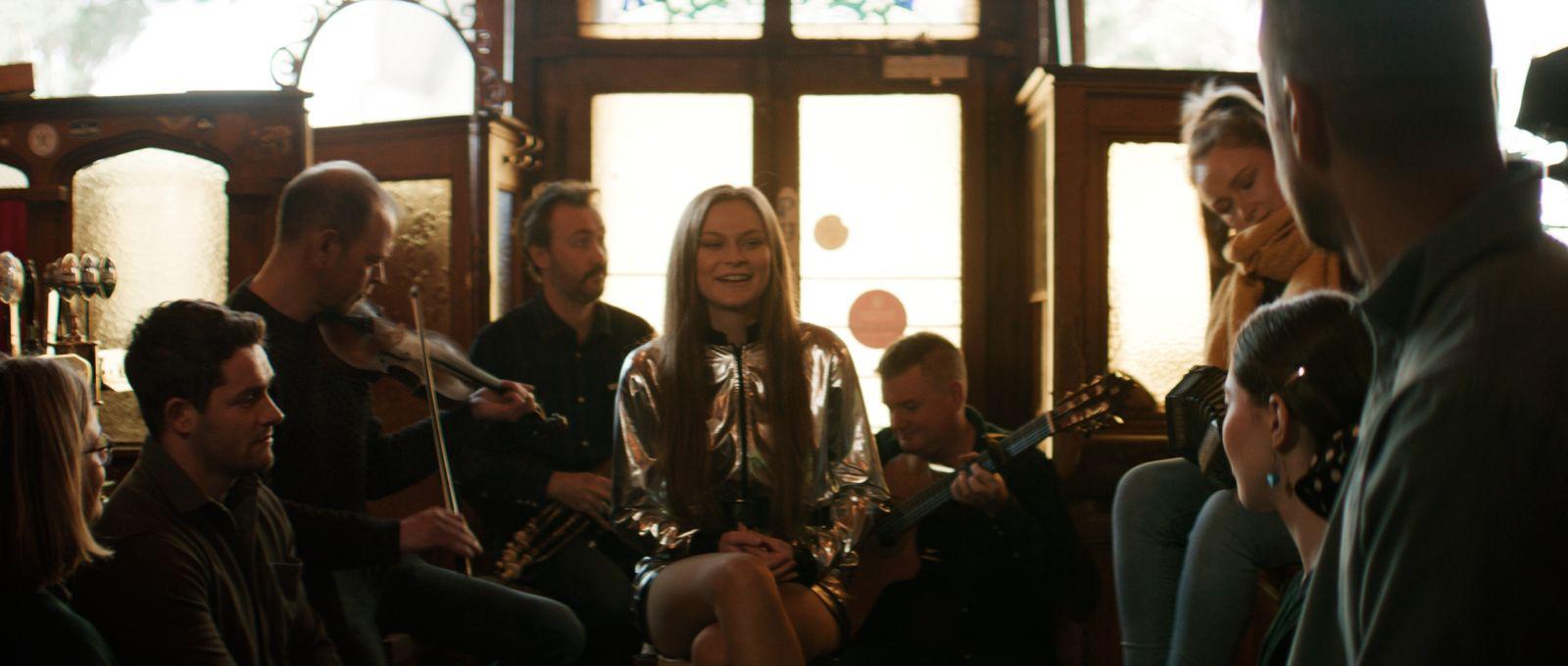 Emmys Fill Your Heart with Ireland Challenge singing in a pub