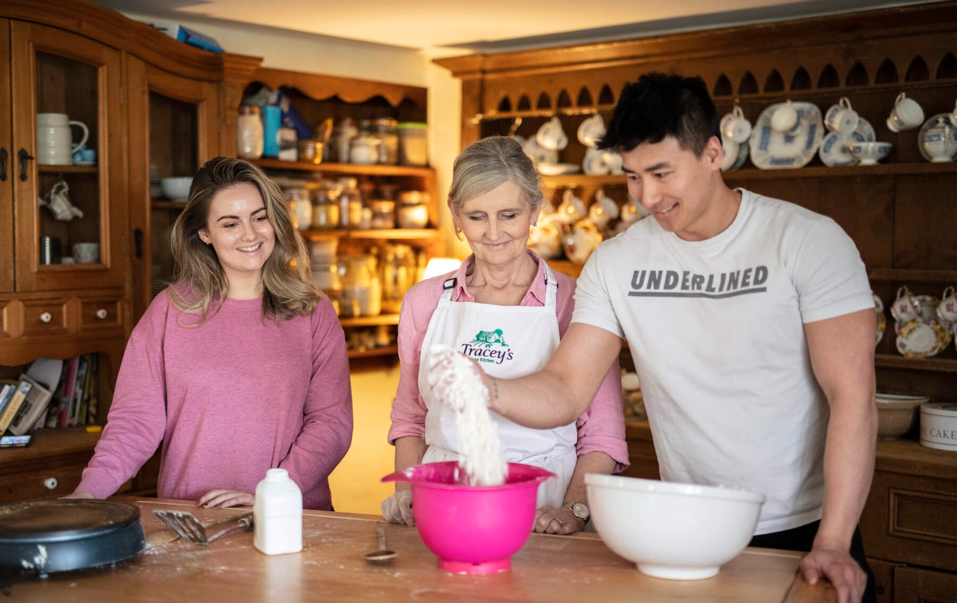 Group bakes bread with Tracey at her farmhouse kitchen in County Down, sharing skills in a cosy setting.
