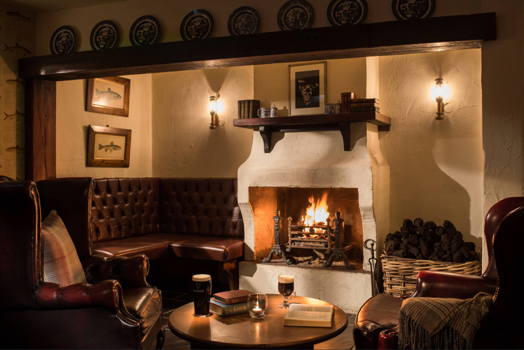 Leather armchairs, pints of Guinness and a roaring open fire in the traditional lounge of the Bushmills Inn, County Antrim.