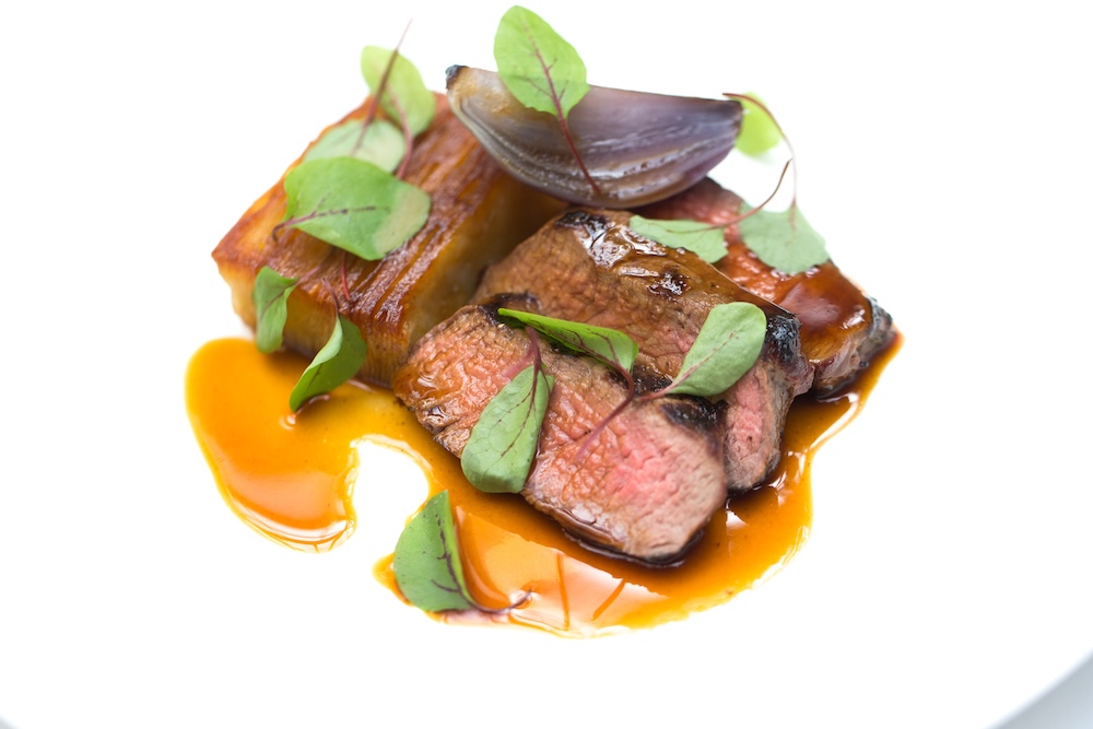 Grilled beef with vegetables, greens and rich sauce at Meat Locker in Belfast.
