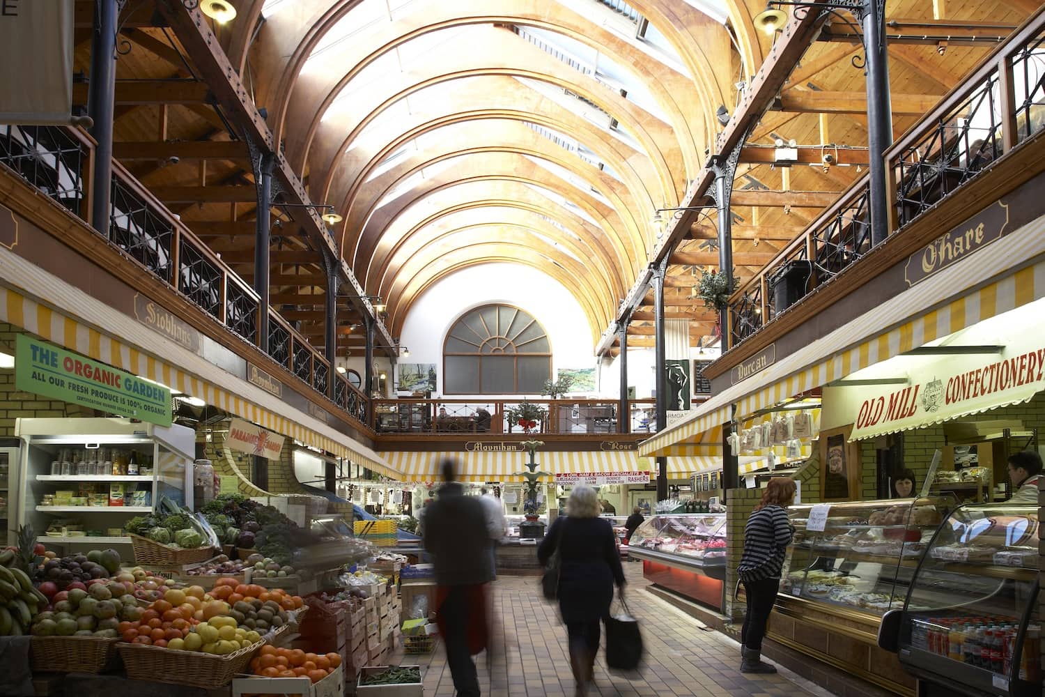 Fresh produce and food stalls inside the historic English Market in Cork city.