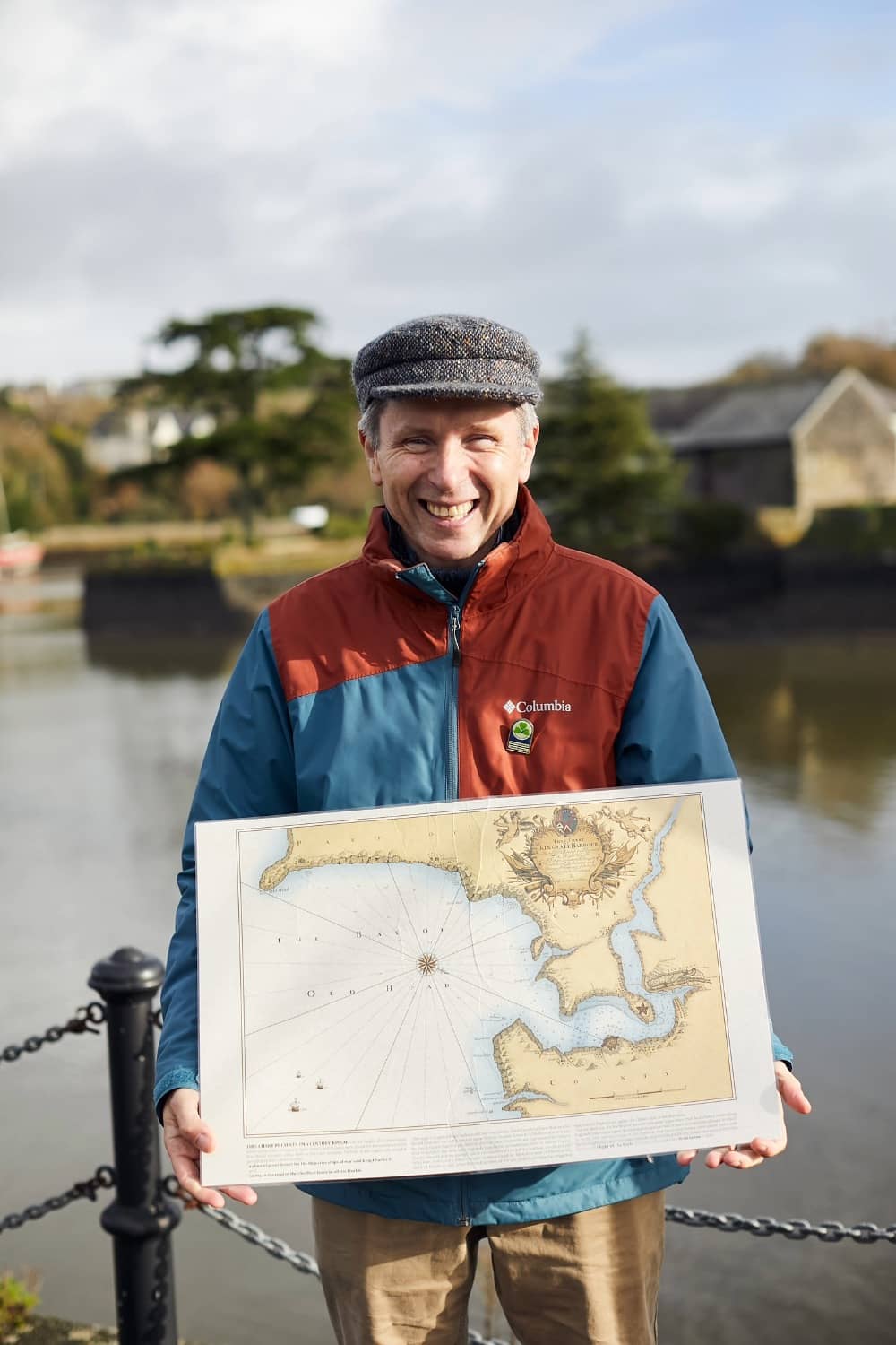 Barry Moloney holding a historic map during the Kinsale Historic Stroll walking tour, County Cork.