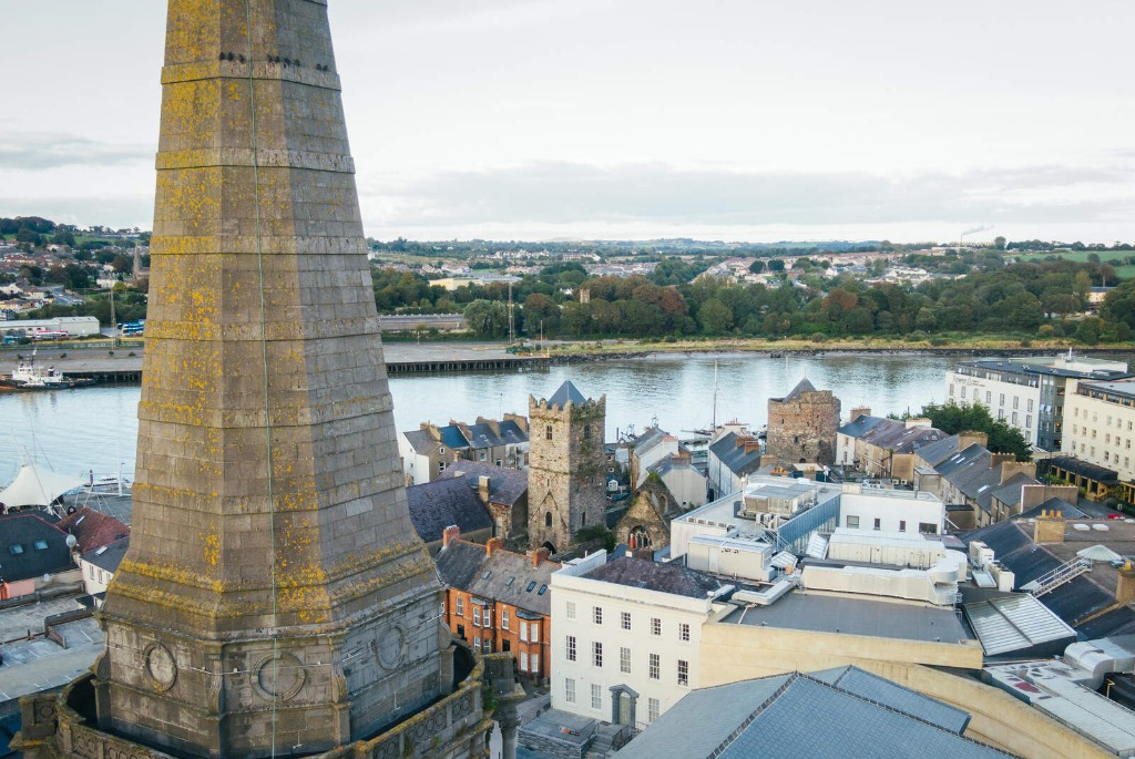 Aerial view of Waterford city with Reginald’s Tower, medieval buildings, and the River Suir.