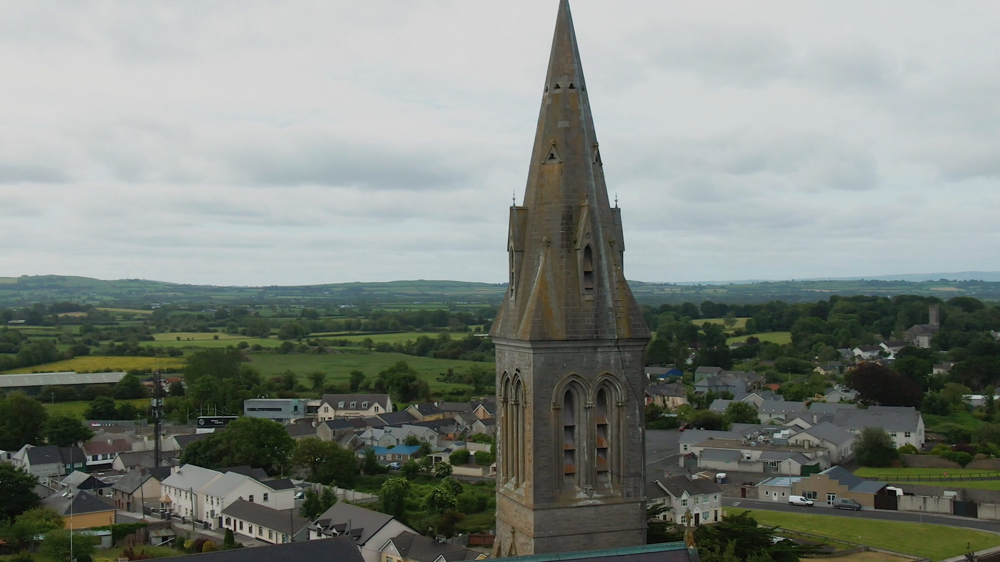 Spire of a historic church rising above the town of Rathkeale on the Limerick Greenway.