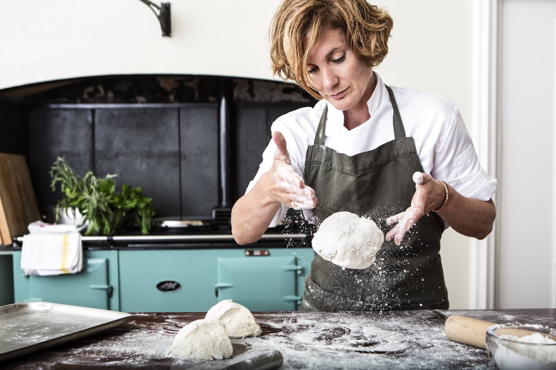 Chef preparing handmade bread dough during a cookery class at Howth Castle, County Dublin.