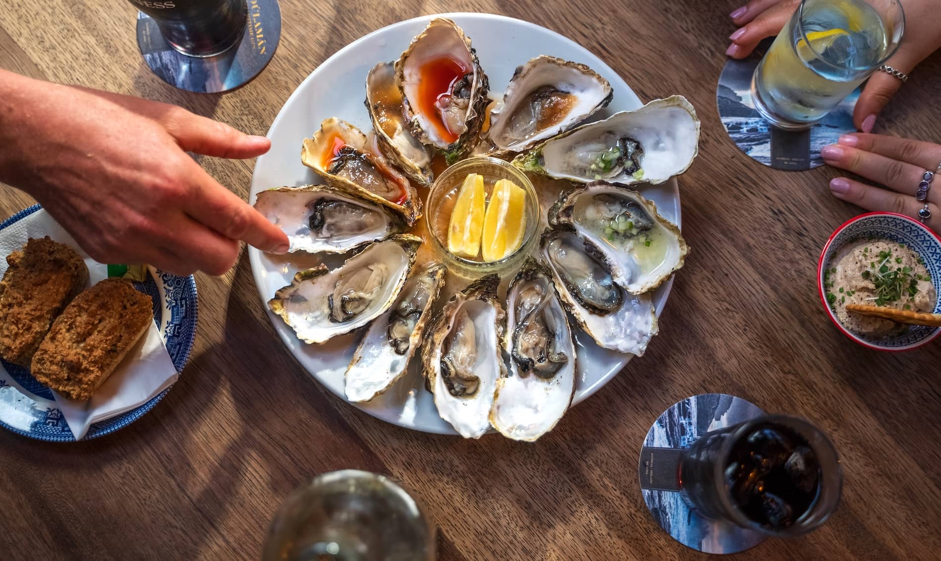 Fresh oysters served at Nancy's Bar in County Donegal, accompanied by lemon wedges and traditional Irish fare.