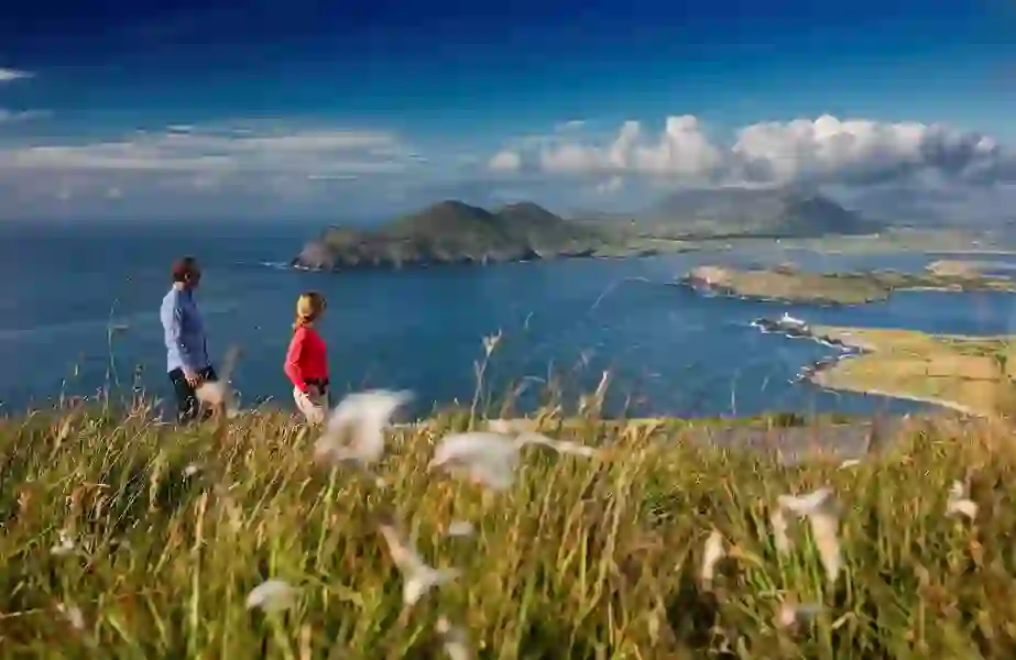 Couple walking on Geokaun Mountain Valentia Island  Co Kerrywebsize2500x1200px
