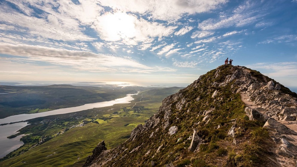 View from the summit of Errigal Mountain overlooking lakes and landscapes in County Donegal.
