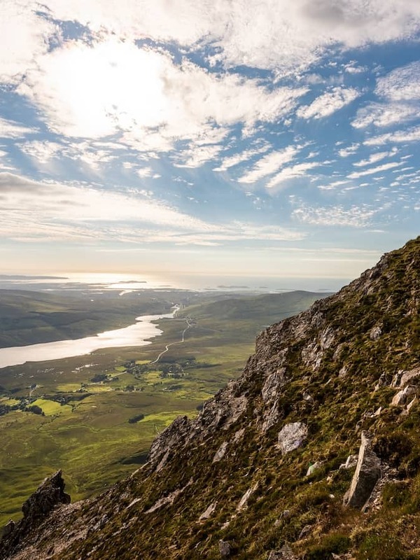 View from the summit of Errigal Mountain overlooking lakes and landscapes in County Donegal.