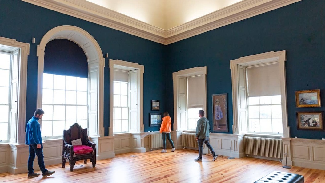 Visitors exploring galleries and artworks inside The Hunt Museum in Limerick City.