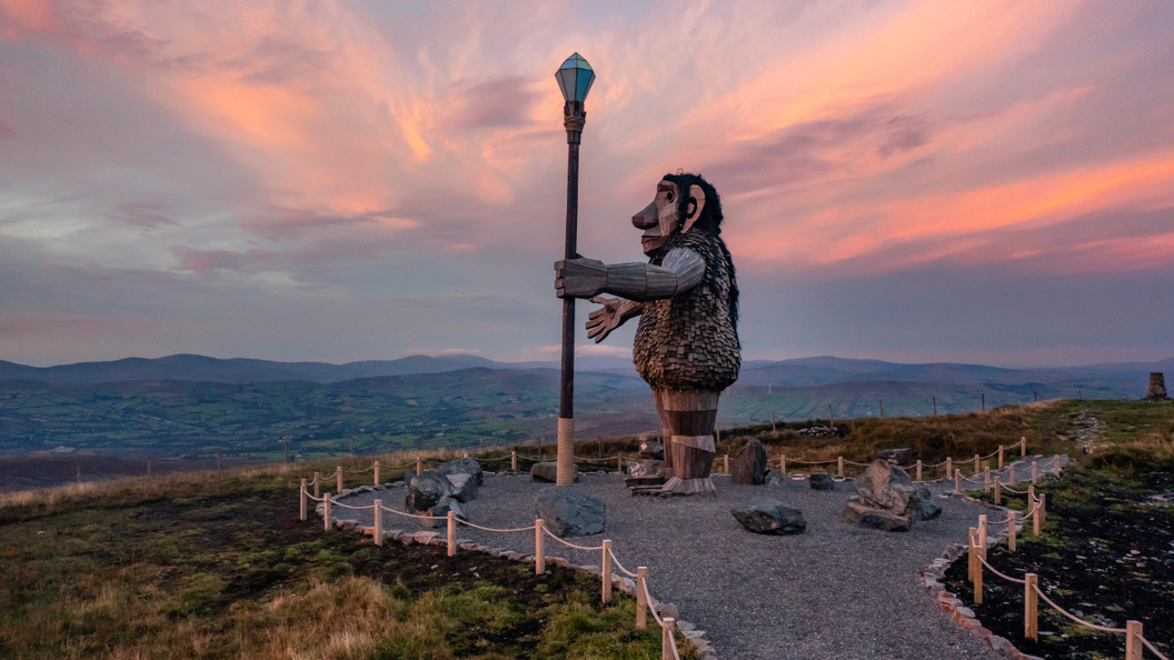 Giant of the Sperrins sculpture overlooking the Sperrin Mountains at sunset in County Tyrone.