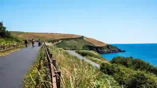 Waterford Greenway cycling route overlooking the rugged County Waterford coastline on a sunny day.
