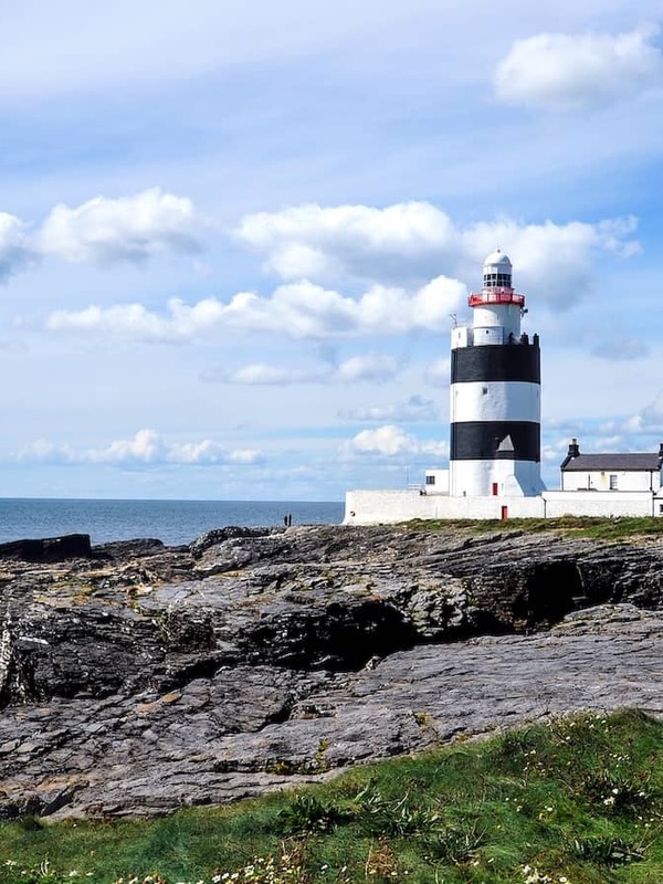 Hook Head Lighthouse overlooking the rocky coastline of County Wexford.
