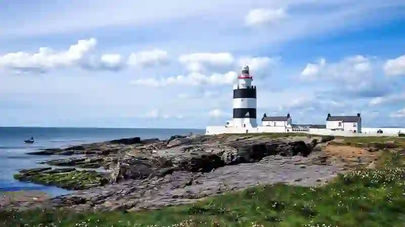Hook Head Lighthouse overlooking the rocky coastline of County Wexford.