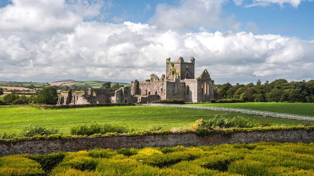 Ruins of Dunbrody Abbey surrounded by green fields in County Wexford.