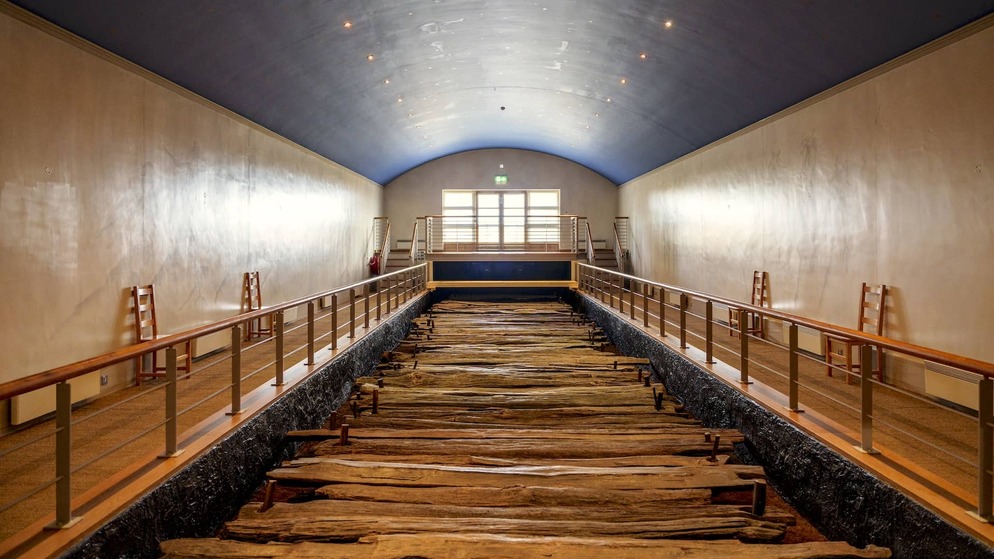 Ancient Corlea Trackway in County Longford, preserved Iron Age oak road displayed in a museum.