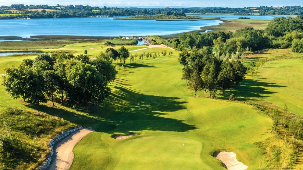 Aerial view of Glasson Lakehouse Golf Course, Westmeath, with green fairways beside the blue waters of Lough Ree.