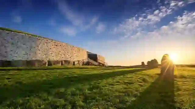 Sunrise over the prehistoric Newgrange passage tomb at Brú na Bóinne in County Meath, Ireland.