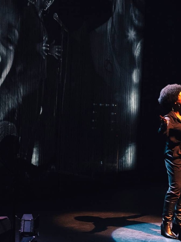 Soul singer performing with pianist and jazz band at Belfast International Arts Festival.