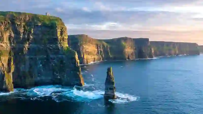 Dramatic aerial view of the Cliffs of Moher rising above the Atlantic Ocean along the County Clare coastline.