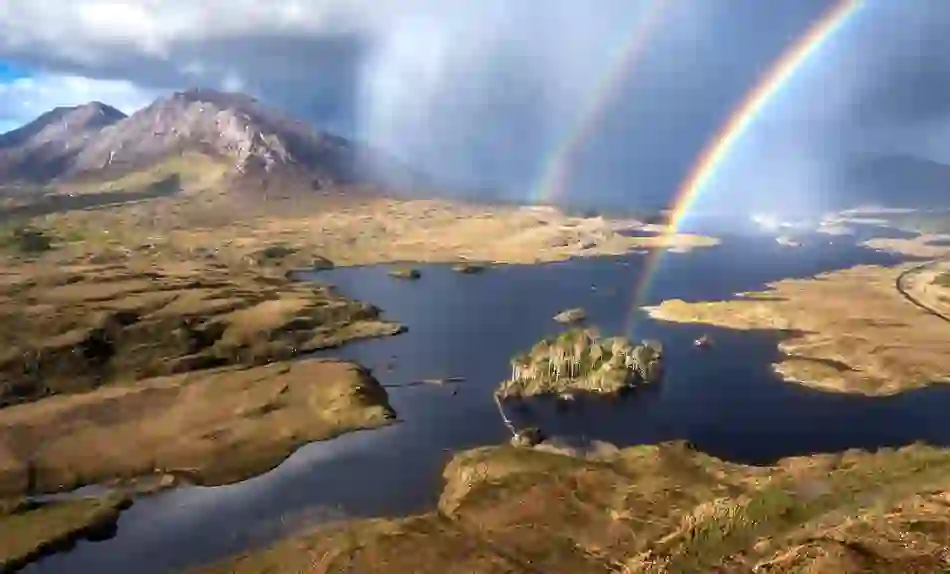 Double rainbow over Pine Island and the rugged lakes and mountains of Connemara, County Galway.