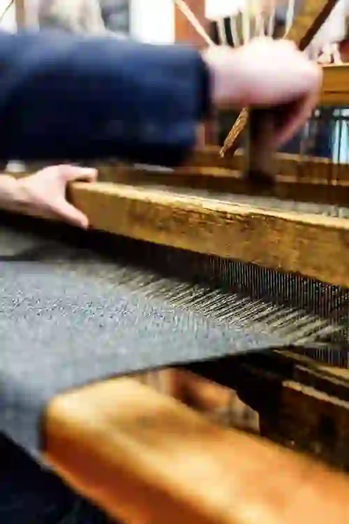 Traditional Magee tweed being handwoven on a loom in Donegal Town, County Donegal.