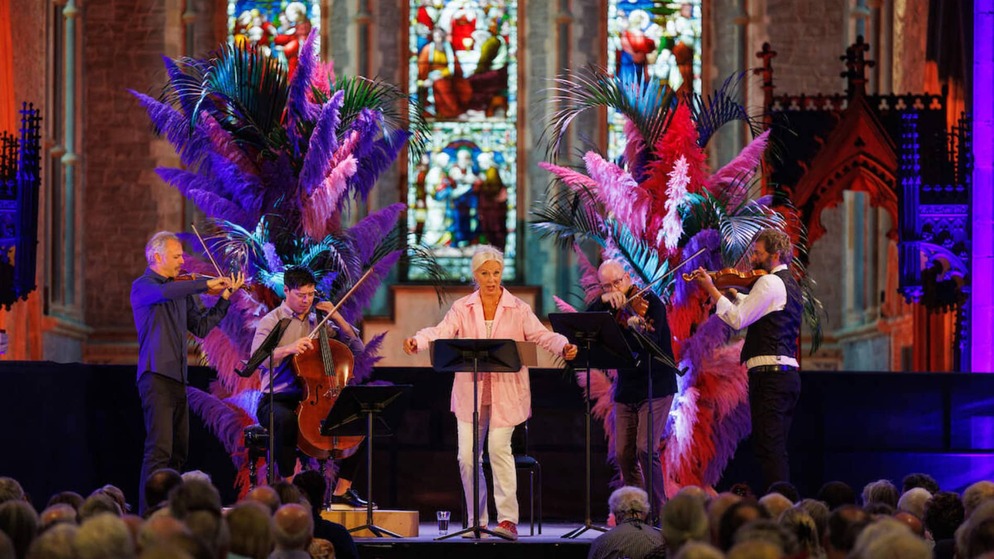 Musicians performing with a singer at Kilkenny Arts Festival inside St Canice’s Cathedral.