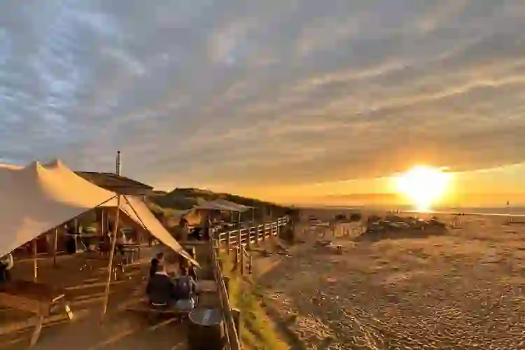Sunset dining beside the beach at Harry’s Shack on the County Londonderry coast.