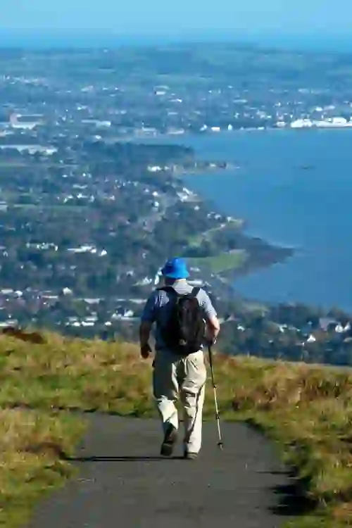 cavehillwalkingtour-manwalking-portrait