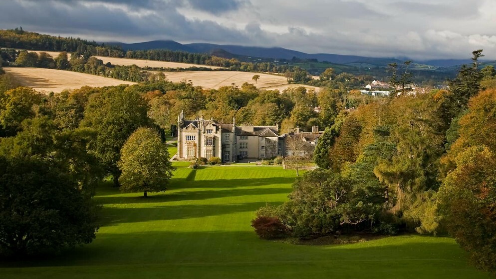 Killruddery House framed by autumn trees and rolling fields near Bray, County Wicklow.