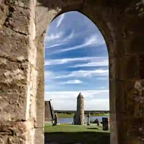 Clonmacnoise monastic site and round tower overlooking the River Shannon in County Offaly, Ireland.