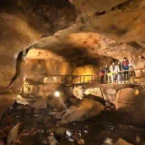 Visitors exploring the illuminated Marble Arch Caves on a guided underground tour in County Fermanagh.
