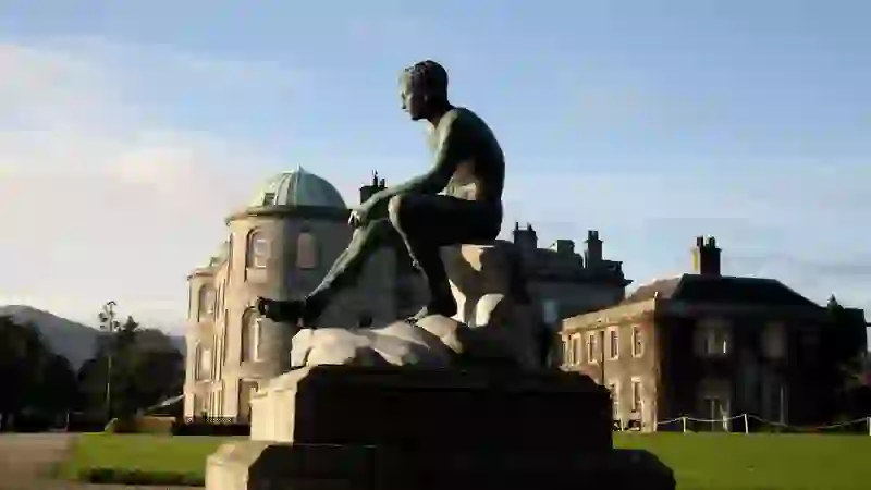 Statue on terrace at Powerscourt House with domed architecture in County Wicklow.