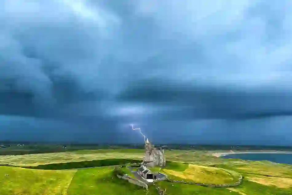 Lightning behind Classiebawn Castle, County Sligo, along Ireland's Wild Atlantic Way.