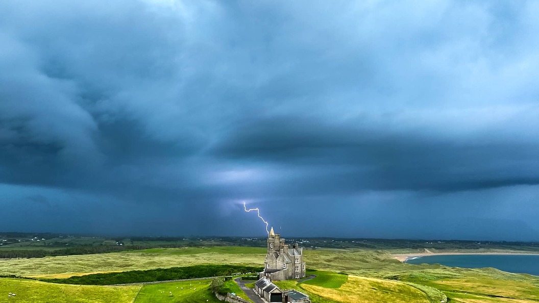 Lightning behind Classiebawn Castle, County Sligo, along Ireland's Wild Atlantic Way.