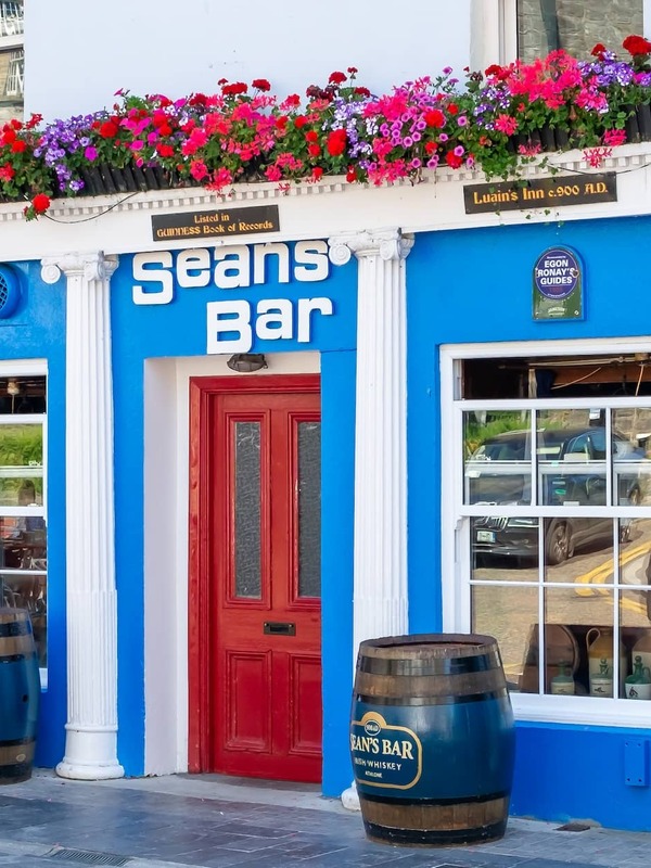 Sean's Bar in Athlone, County Westmeath, recognised as one of Ireland's oldest pubs and adorned with colourful flowers.