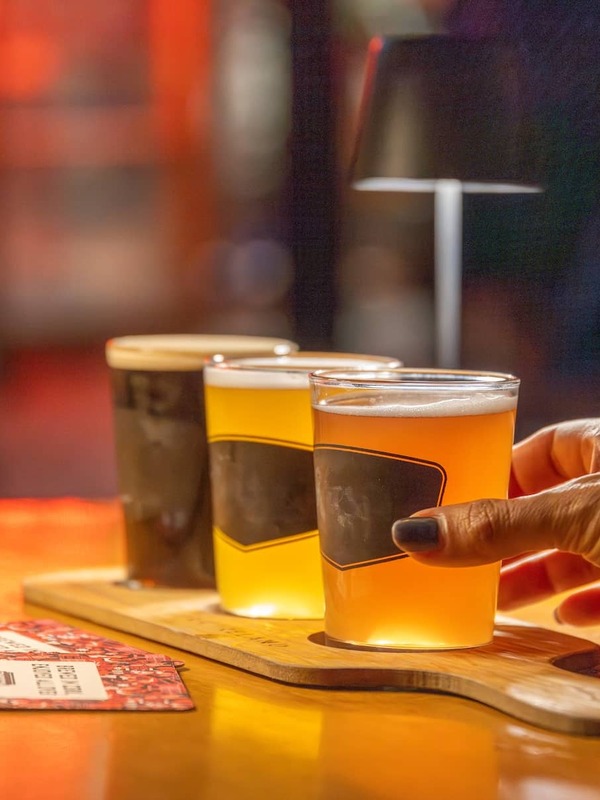 Beer tasting paddle at Franciscan Well Brewery, County Cork, featuring a selection of craft beers.