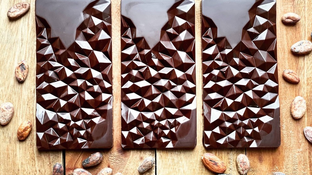 Artisan dark chocolate bars crafted by NearyNógs Chocolatiers in County Down, made from ethically sourced cacao beans.
